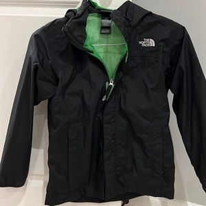 North face black rain jacket with hood and zippered pockets. Like new. Youth M